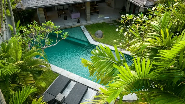 Aerial view of a house with a swimming pool