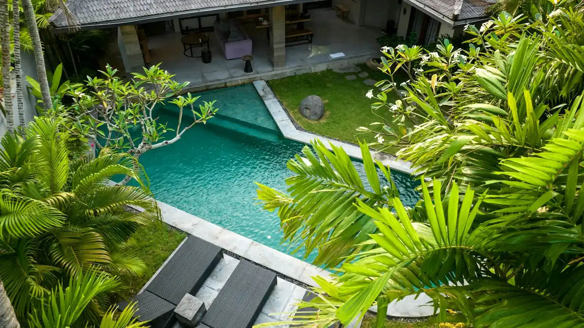 Aerial view of a house with a swimming pool