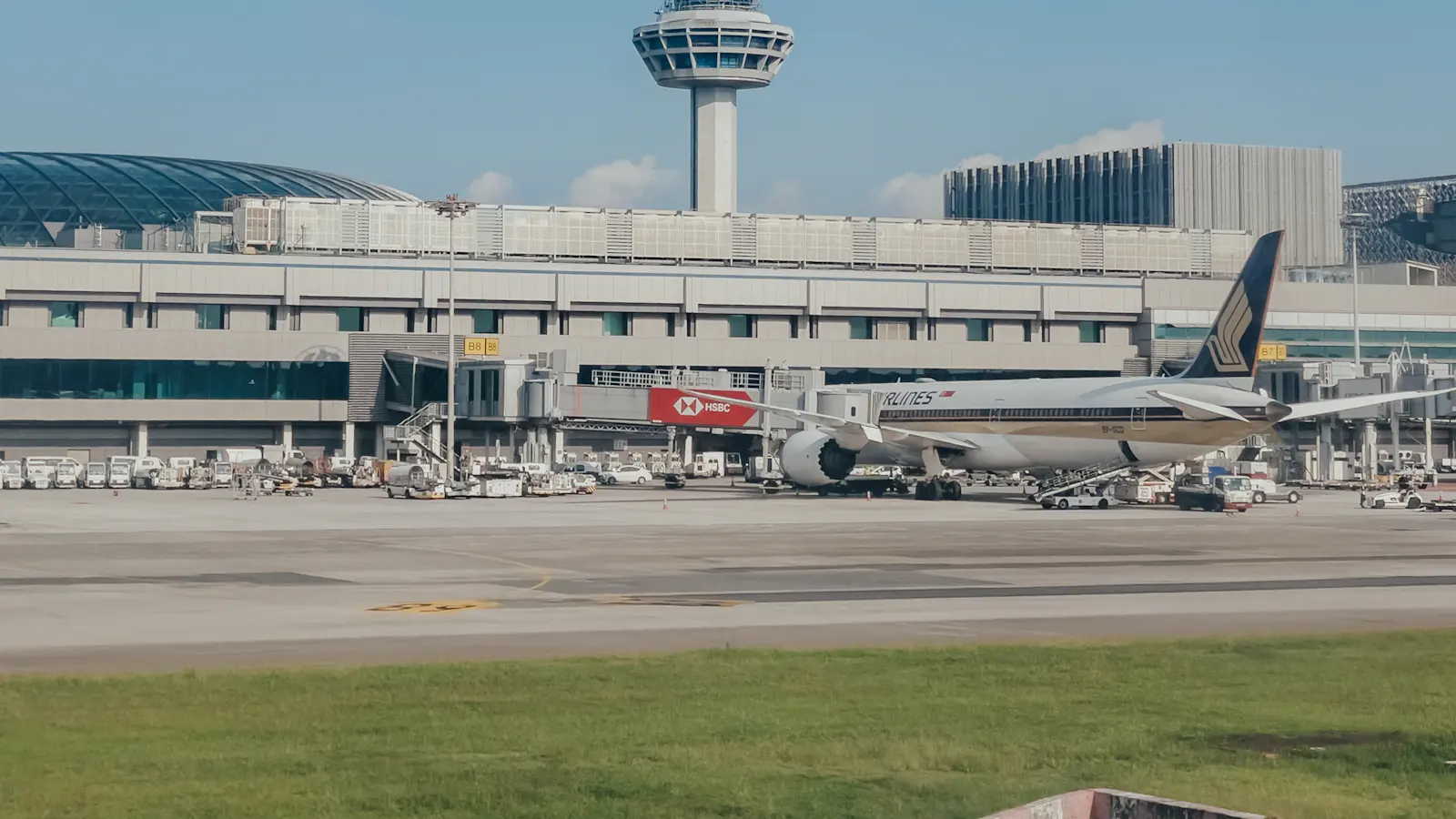 Large jetliner sitting on the tarmac at an airport