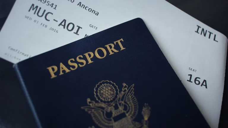 Passport booklet on top of white paper