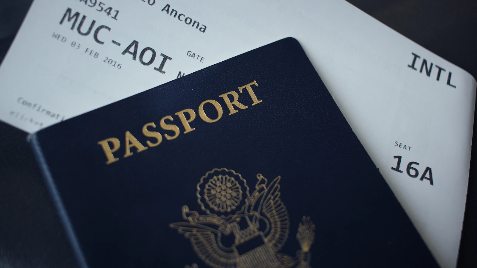 Passport booklet on top of white paper