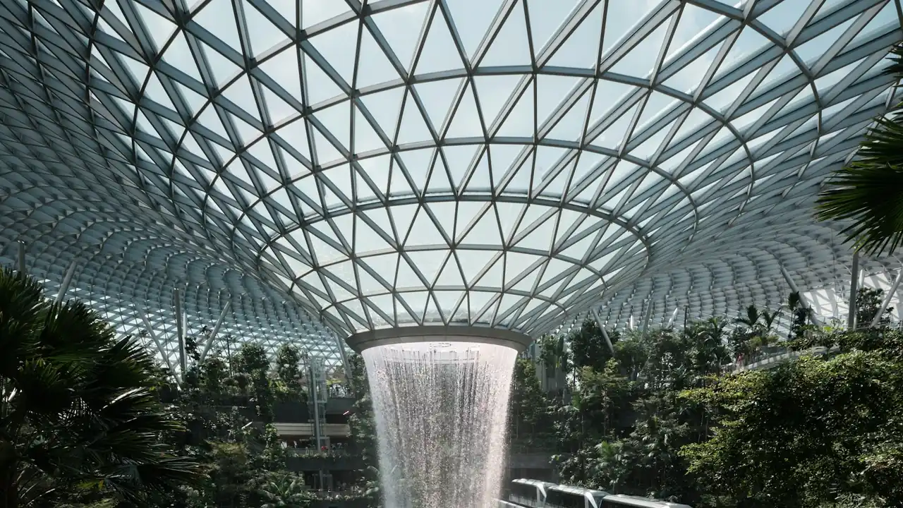 Waterfall in the middle of a tropical garden inside Changi Airport, Singapore